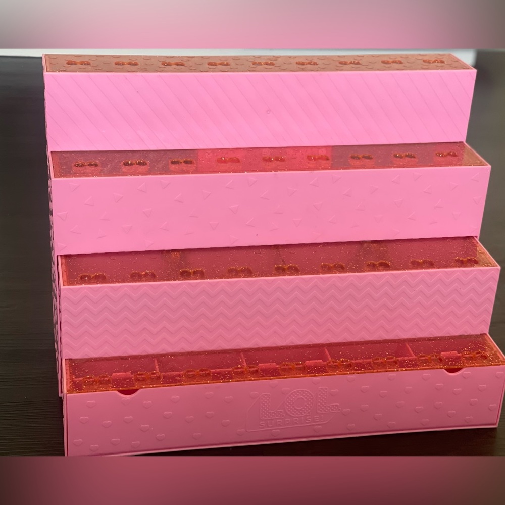 Used LOL dolls stand and storage.